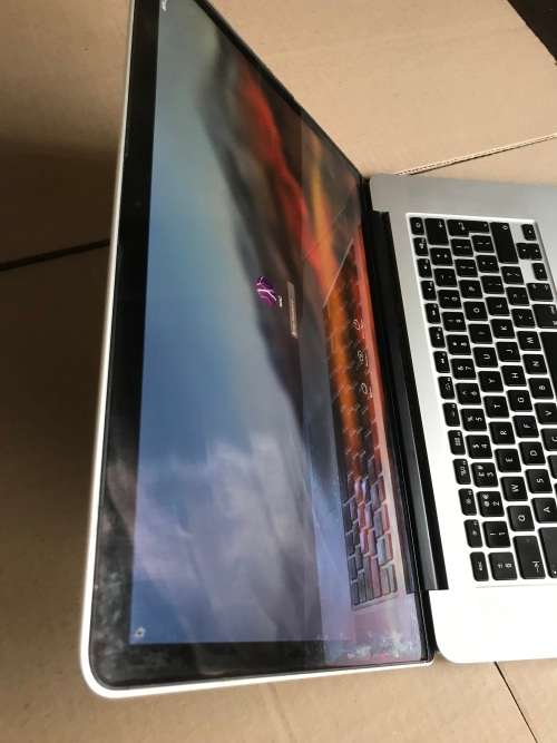 2015 Apple MacBook Pro with intel I7 (15-inch, 16GB RAM, 256GB SSD)- Silver